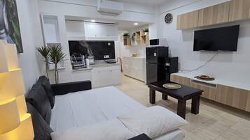 In-room safe, iron/ironing board, travel crib, WiFi (free)