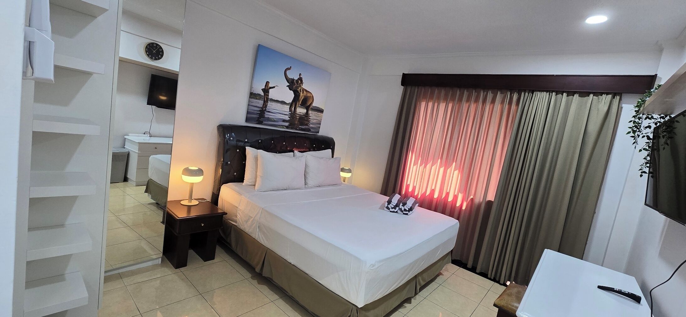In-room safe, iron/ironing board, travel crib, WiFi (free)
