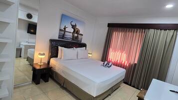 In-room safe, iron/ironing board, travel crib, WiFi (free)
