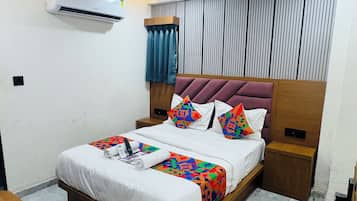 Deluxe Double Room, City View | In-room safe, desk, laptop workspace, iron/ironing board
