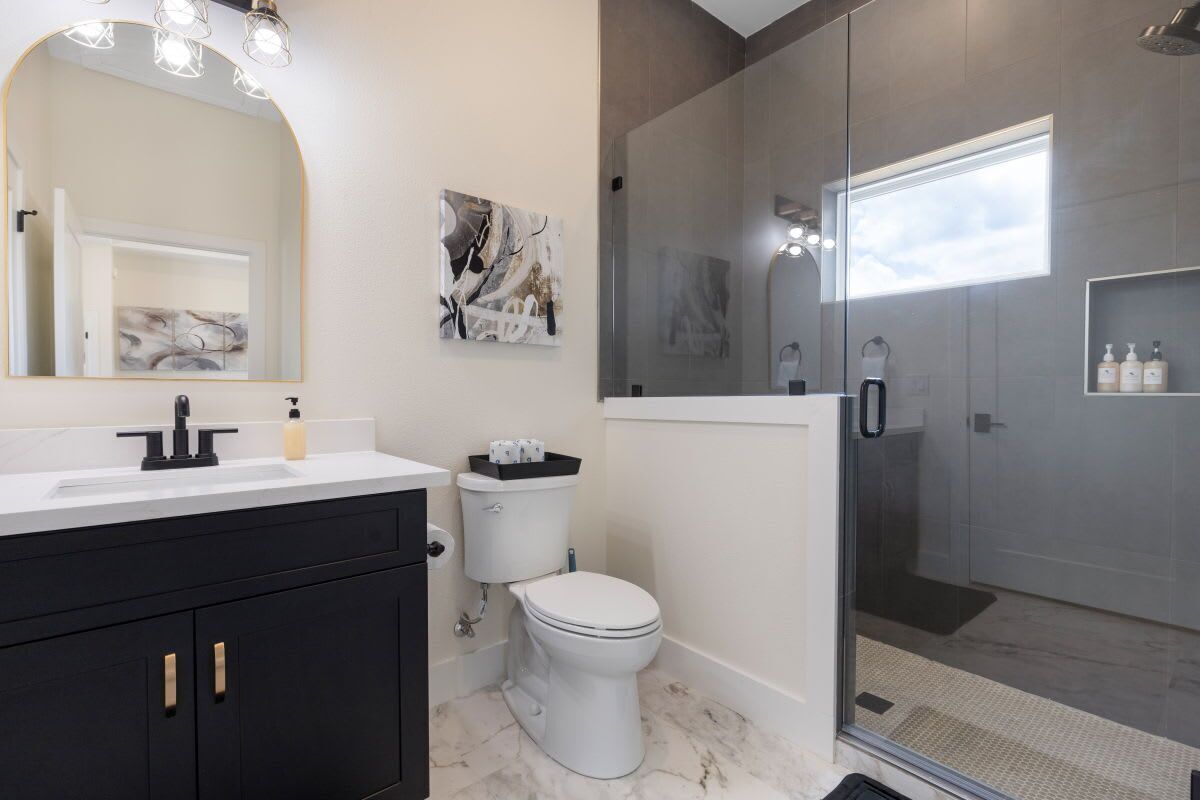 Shower, hair dryer, towels, shampoo