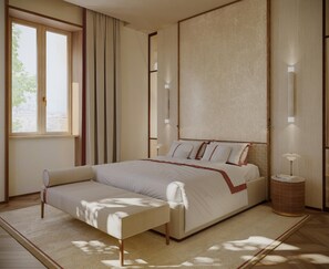 Un dormitorio moderno con una cama grande, una mesita de noche y una ventana con cortinas.