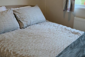 2 habitaciones y ropa de cama