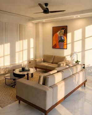 Apartamento, vista para a cidade | Área de estar