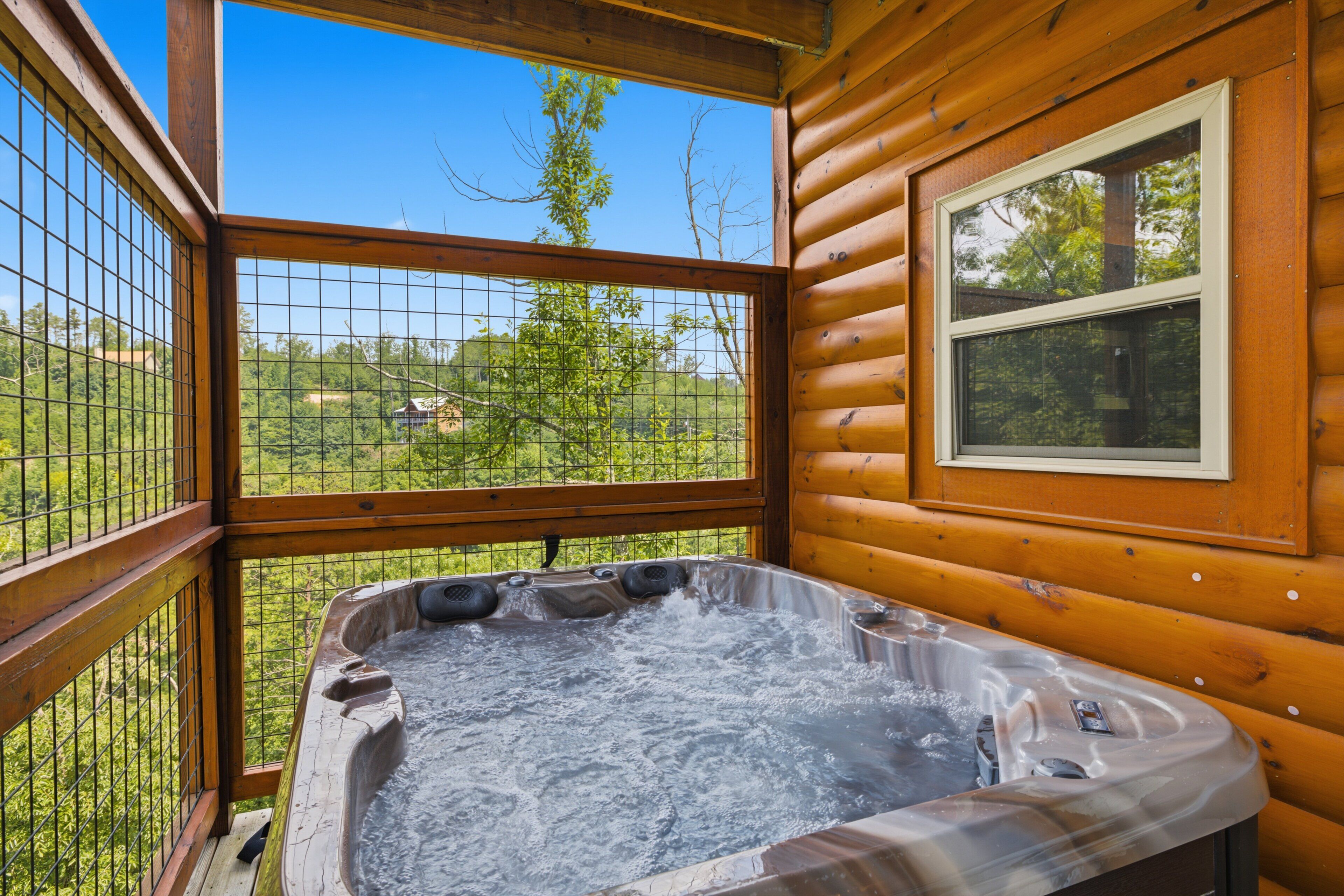 Cabin, 4 Bedrooms | Outdoor spa tub