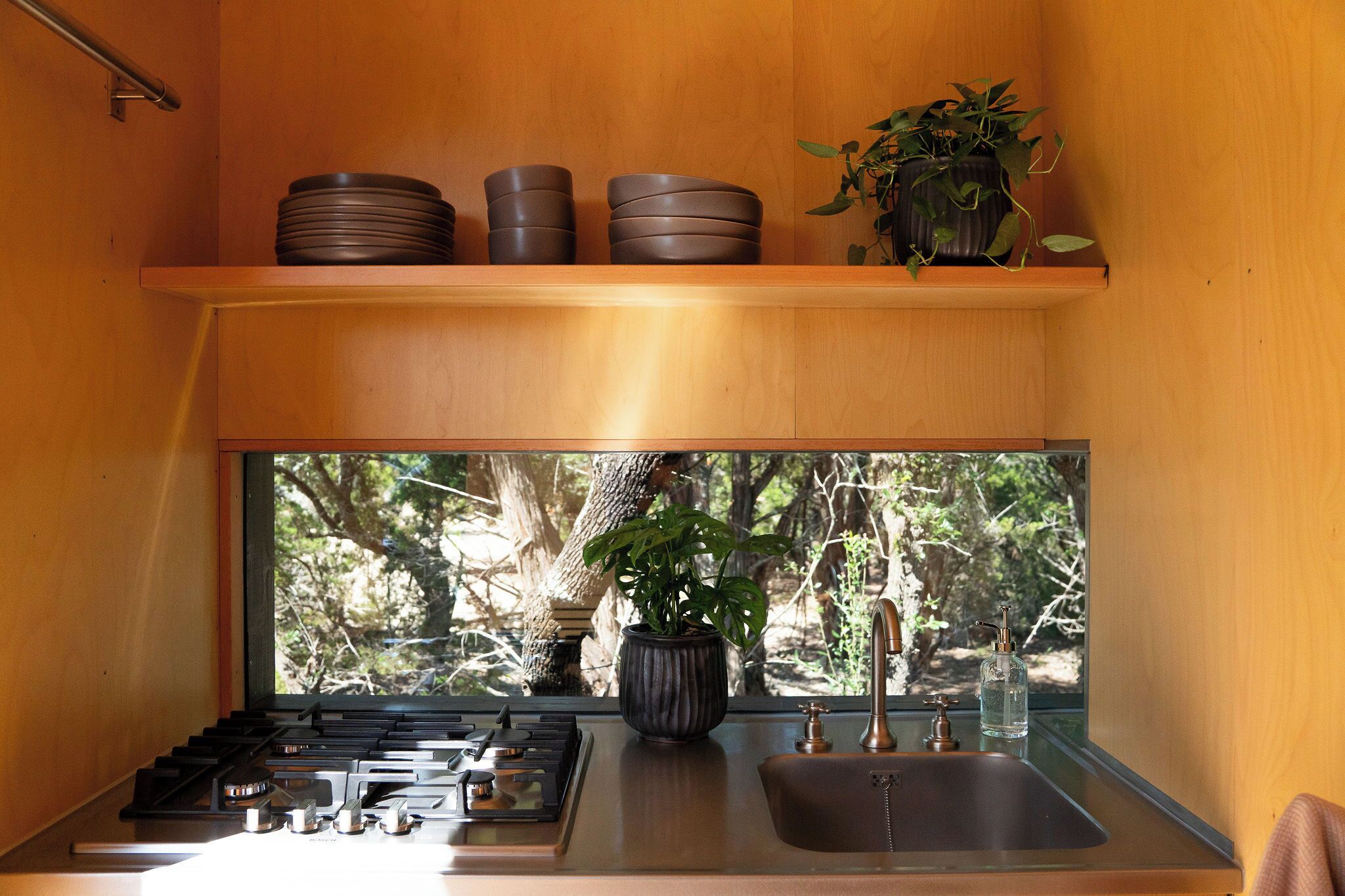 Fridge, microwave, cookware/dishes/utensils, dining table
