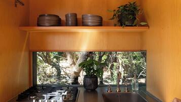 Fridge, microwave, cookware/dishes/utensils, dining table