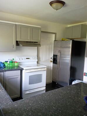 Fridge, microwave, dining tables