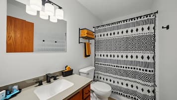 Hair dryer, towels, soap, shampoo
