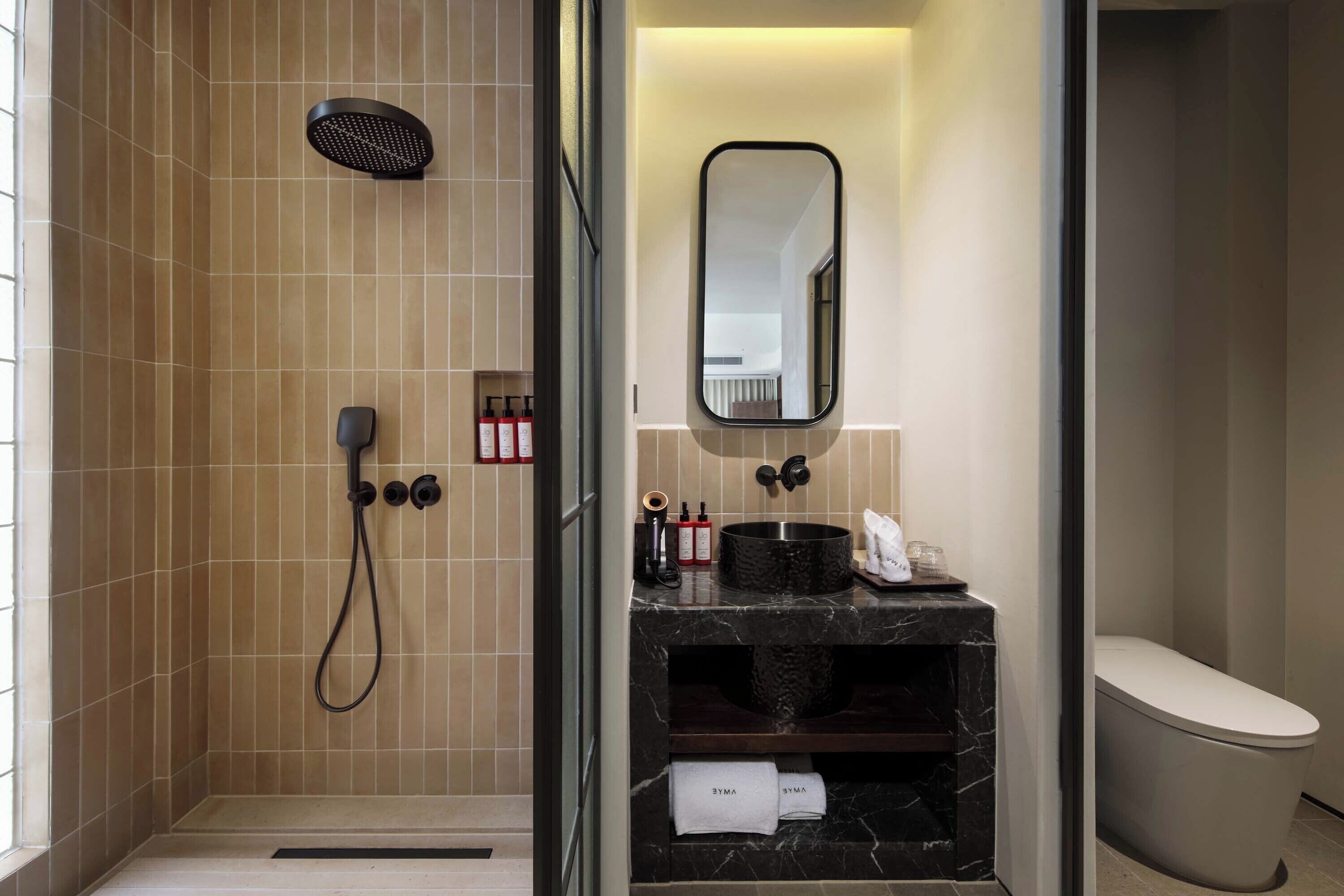 Signature Suite, Valley View | Bathroom | Rainfall showerhead, designer toiletries, hair dryer, bathrobes