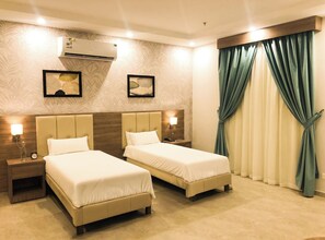 Suite Keluarga, 2 kamar tidur | Ruang kerja ramah laptop dan Wi-Fi gratis