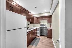 Suíte conforto, varanda, vista para o jardim | Cozinha privada