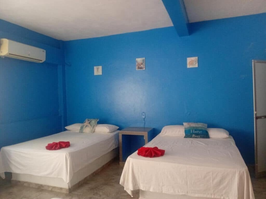 Family Triple Room | Bed sheets