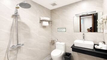 Shower, free toiletries, hair dryer, slippers