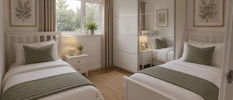A bedroom with two beds, a window with curtains, a bedside table with a lamp, and a mirror.