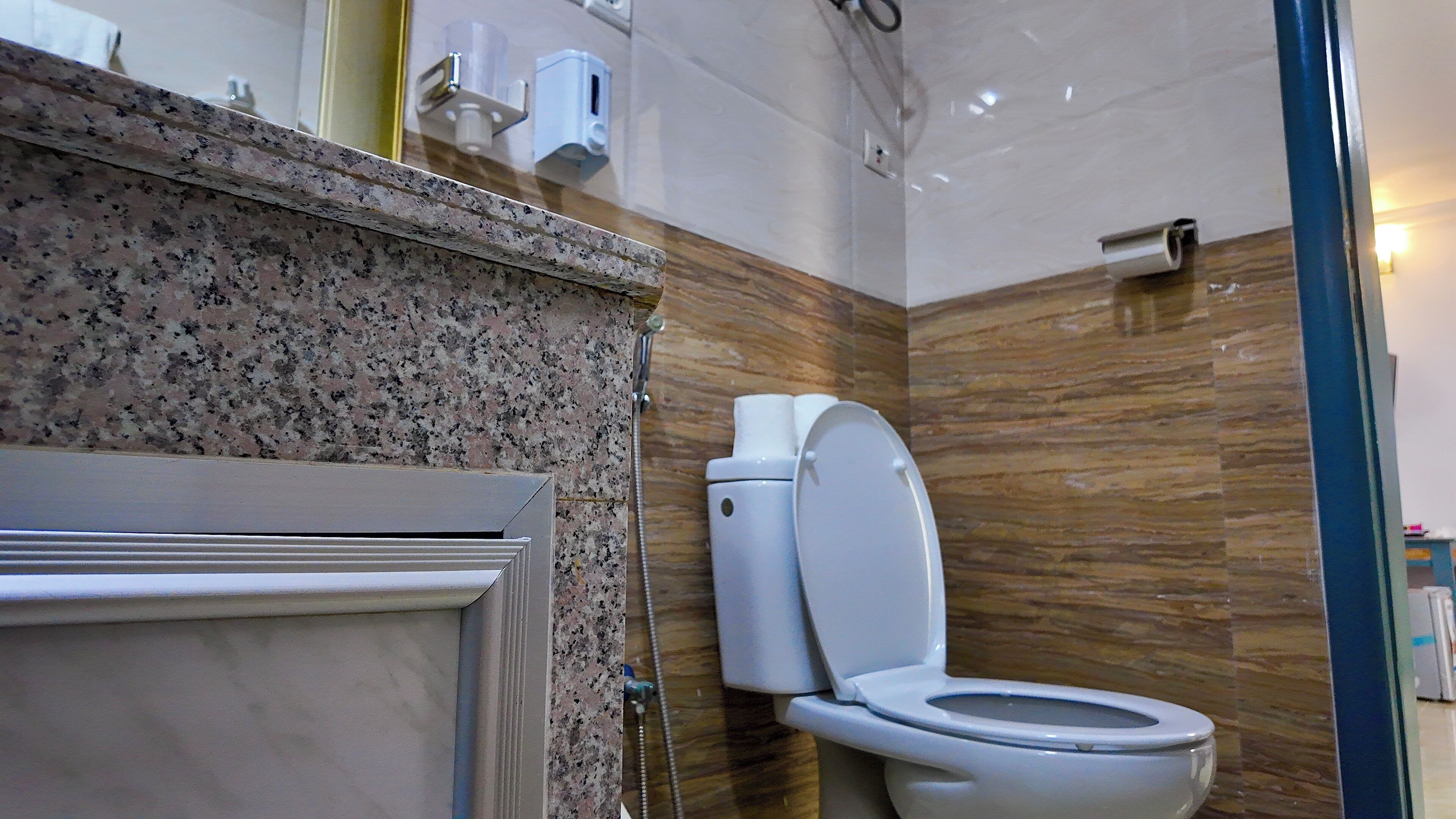 Bathtub, towels, soap, shampoo