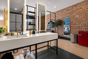 Studio Suite, 1 King Bed | Bathroom | Hair dryer, towels, soap, shampoo - Eleven48 by NOLA Luxury Collection (New Orleans)