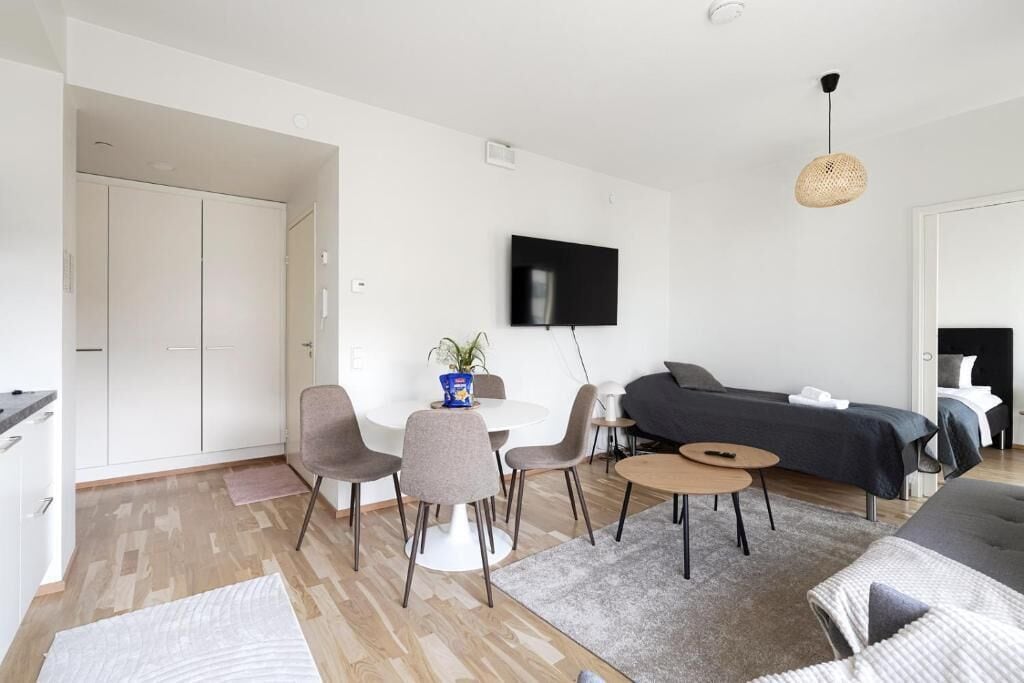 Deluxe Condo, City View | Desk, laptop workspace, blackout drapes, soundproofing