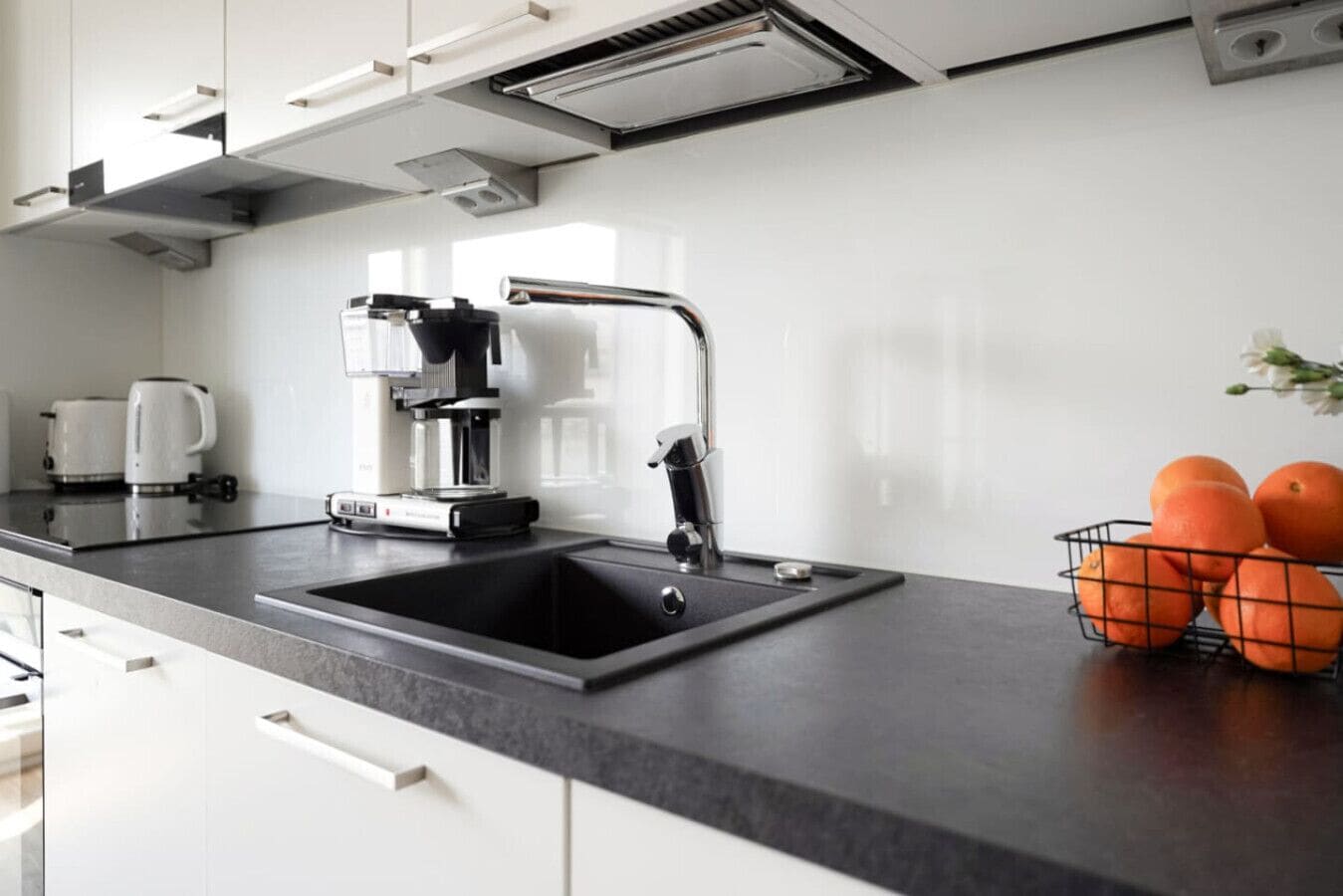 Deluxe Condo, City View | Private kitchen | Coffee/tea maker, fridge, microwave, oven