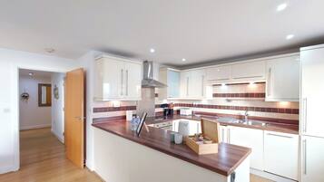 Apartamento conforto, vista para o rio | Cozinha privada