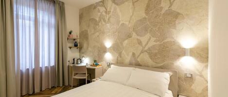Chambre Quadruple Deluxe (Aida) | Coffres-forts dans les chambres, chambres insonorisées