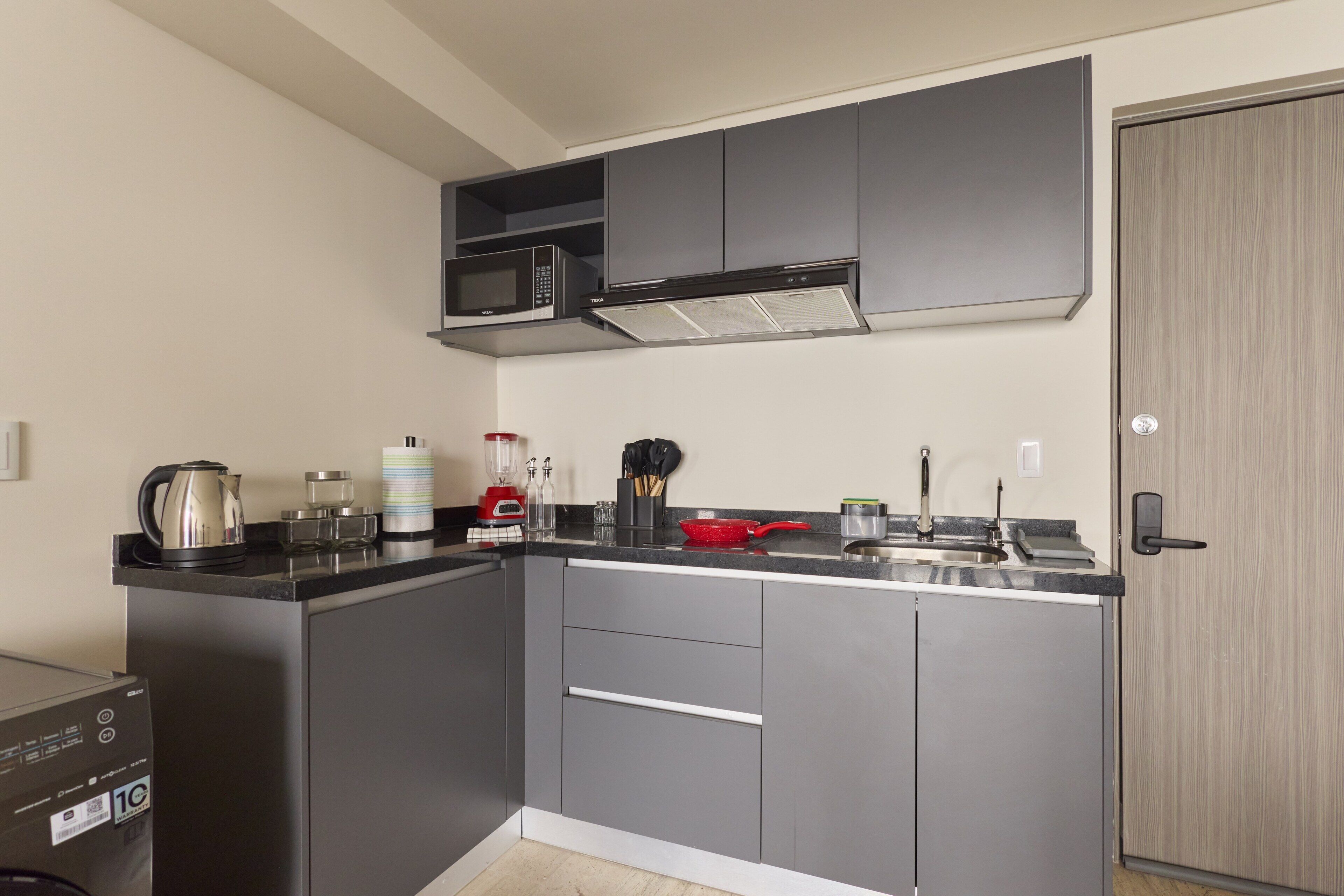 Comfort Apartment, City View | Private kitchen | Fridge, microwave, stovetop, cookware/dishes/utensils