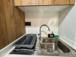 Apartamento superluxo, sacada, vista para o lago | Cozinha privada