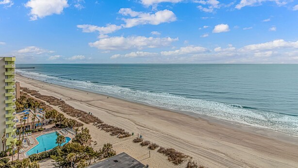 A beachfront hotel with a swimming pool, beach access, and ocean views. - Sea Mist 20102 Ocean Front Condo (Myrtle Beach)