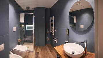 Shower, free toiletries, hair dryer, slippers