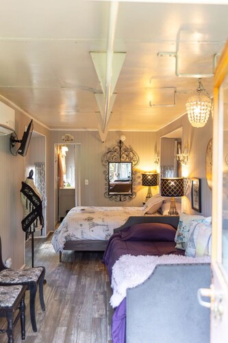 Midnight in Paris Railroad Caboose Cabin