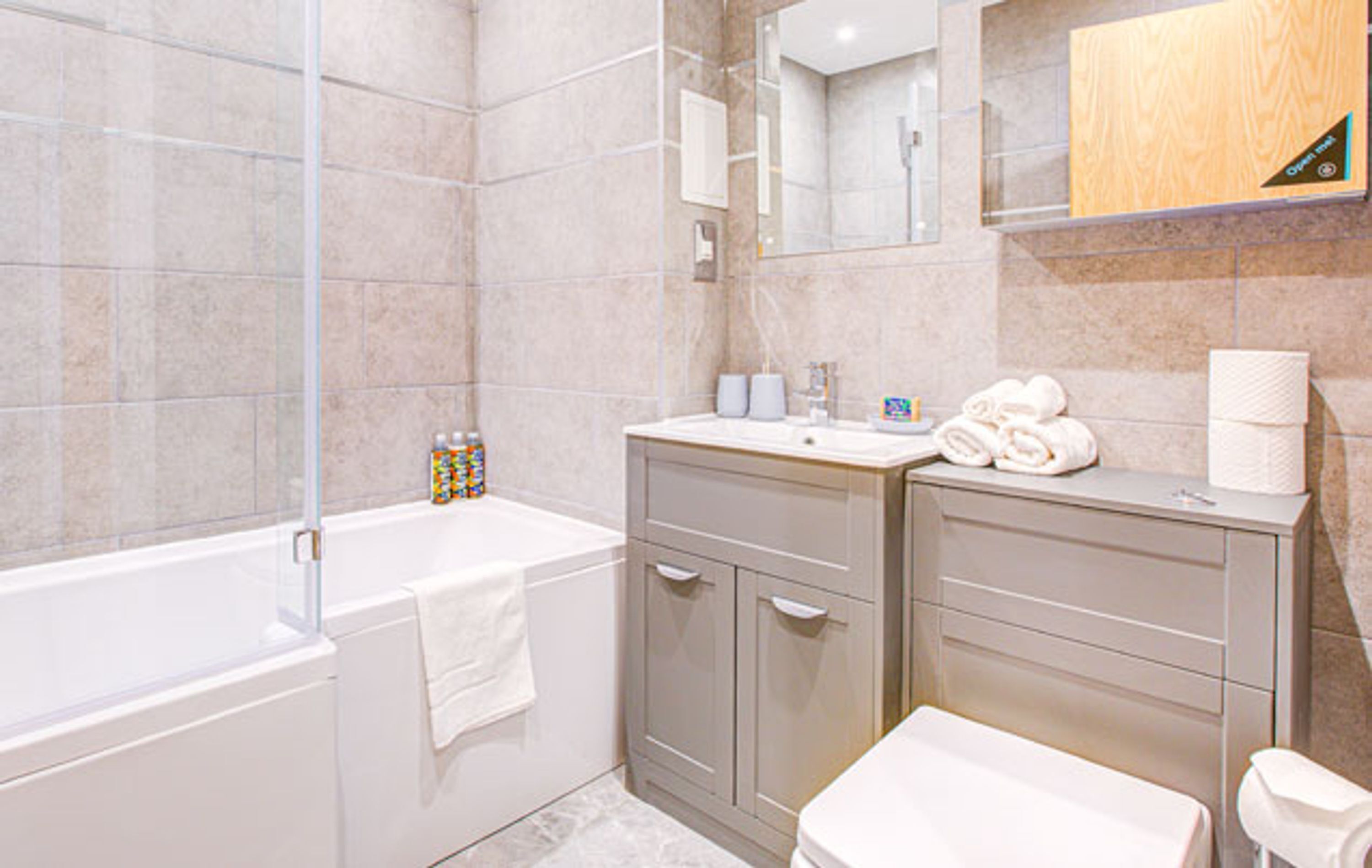 Shower, hair dryer, towels