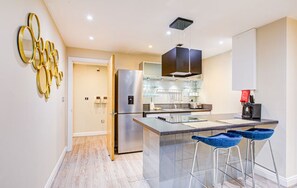 Fridge, microwave, oven, stovetop - Hybrid Resi - Battersea - One Bedroom Apartment (London)