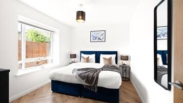 1 bedroom, desk, iron/ironing board, travel cot