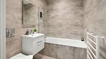 Shower, hair dryer, towels