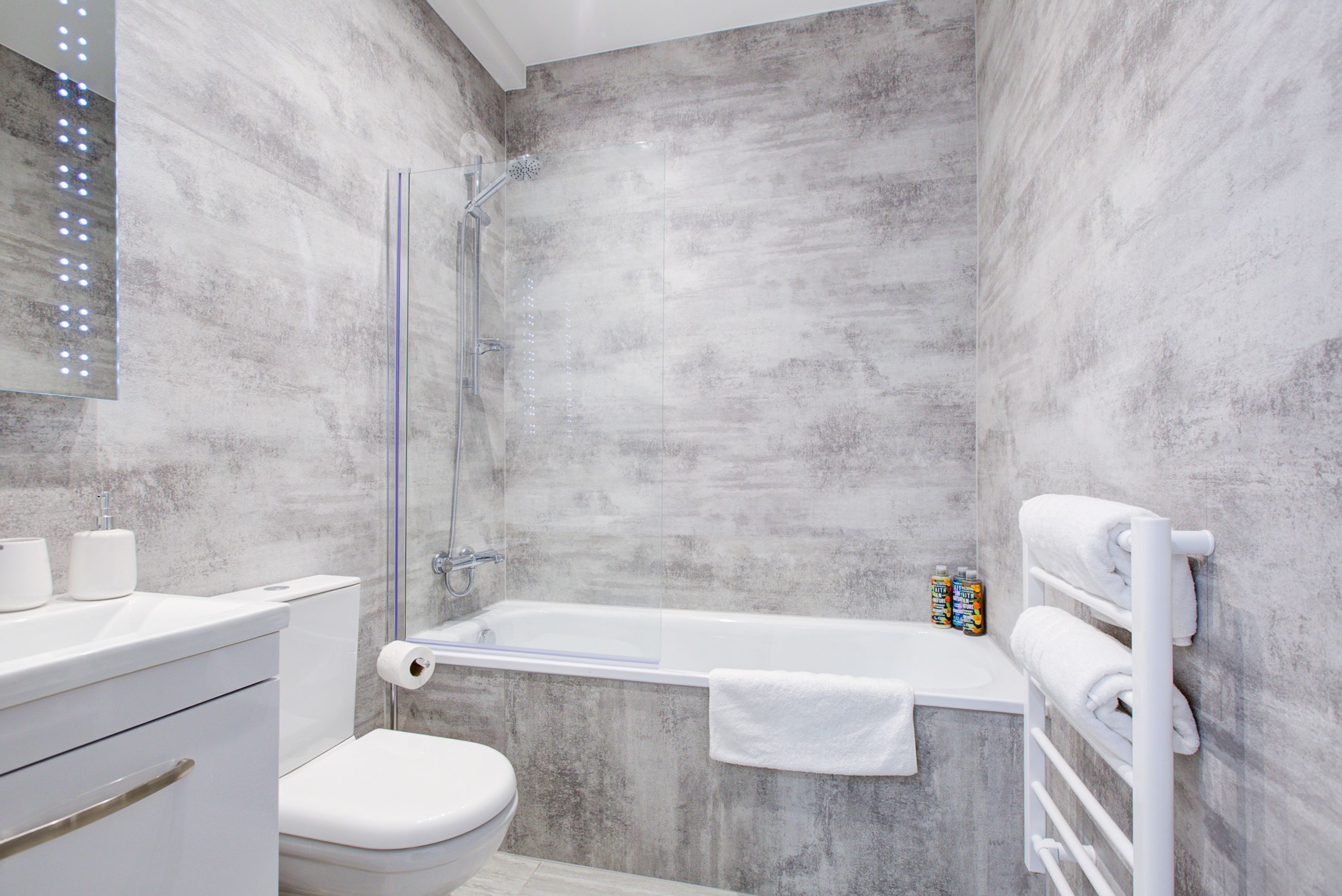 Shower, hair dryer, towels