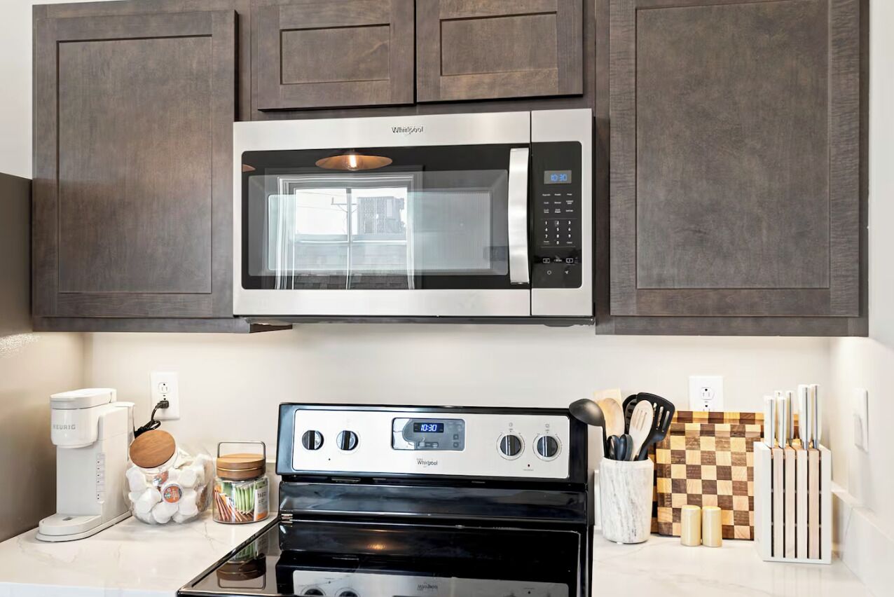Coffee/tea maker, fridge, microwave, oven