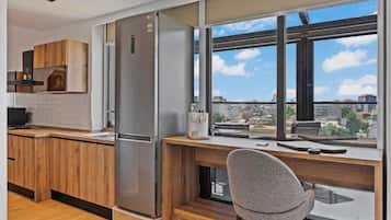 Luxury Penthouse, City View | Private kitchen