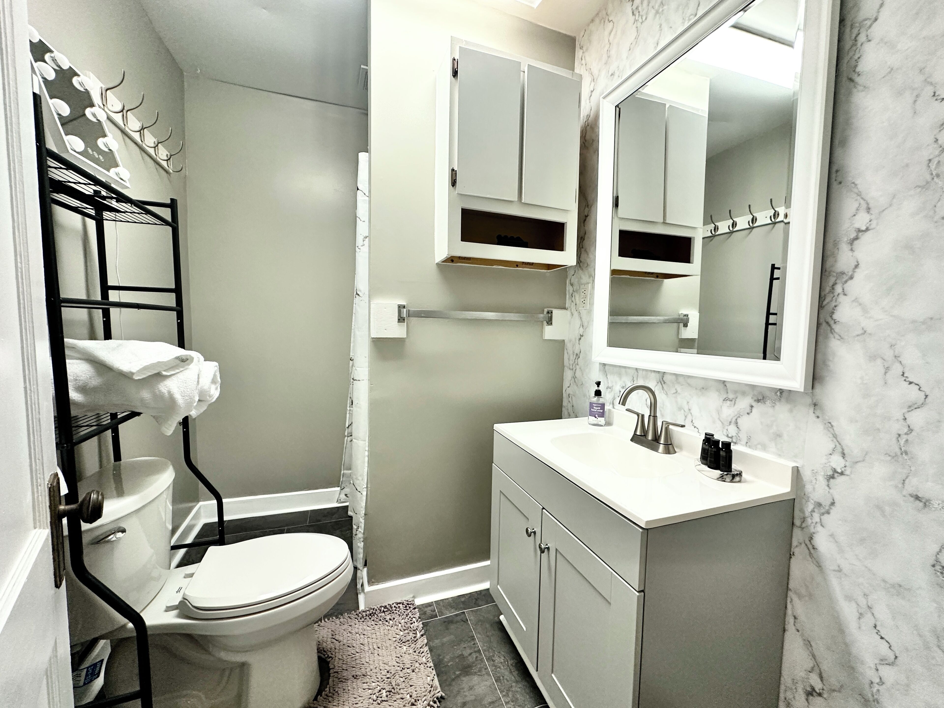Hair dryer, towels, soap, toilet paper