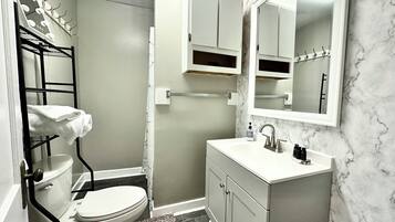Hair dryer, towels, soap, toilet paper
