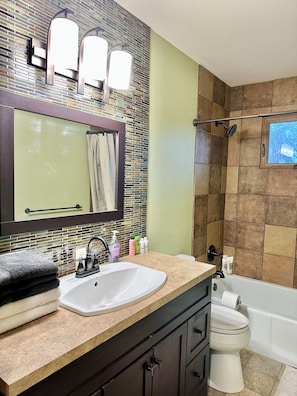 Hair dryer, towels, soap, toilet paper - Peaceful 2 Bedroom Family Condo with Attached Garage • Walk to Dordt + Siouxnami (Sioux Center)