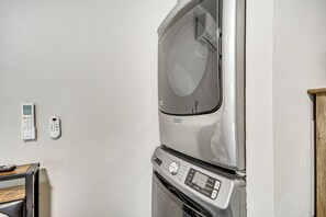 A compact washer and dryer unit with a control panel and a digital display. - Group-Friendly Escape! Gateway to Gulfport Beaches (Gulfport)