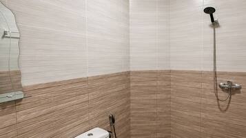Shower, towels, toilet paper