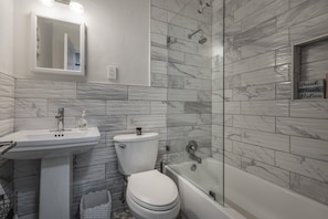 Hair dryer, towels, soap, toilet paper