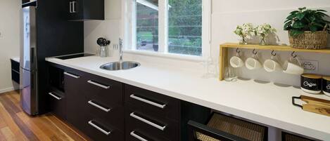 Coffee/tea maker, fridge, microwave, oven