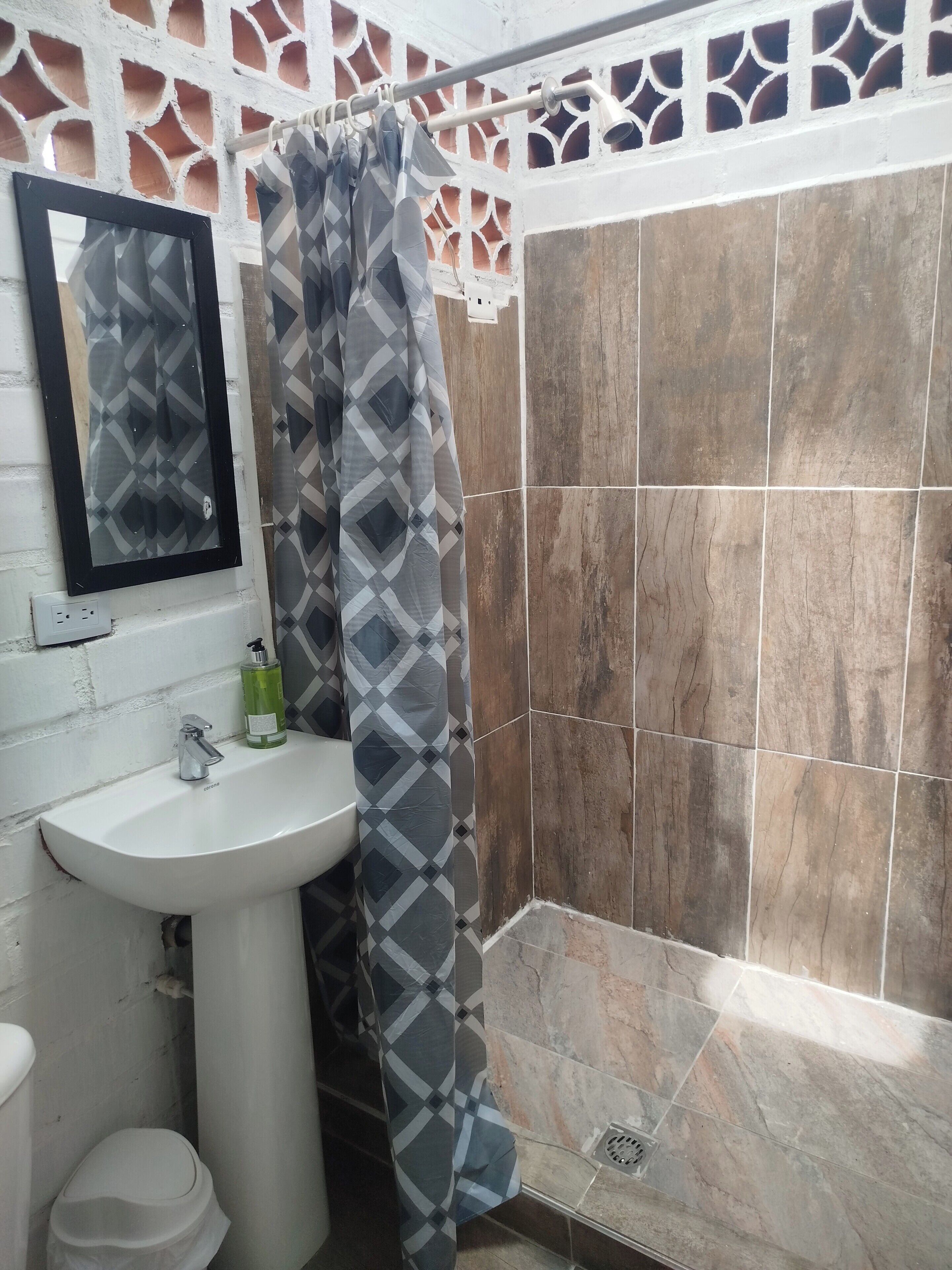 Shower, towels, soap, toilet paper