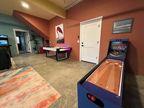 Games room - 2 Houses · Arcade+Speakeasy · Sleep 20 · 100" TV (Ocean Shores)