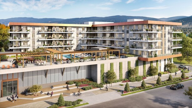 Un edificio residenziale a più piani con balconi, area piscina sul tetto e cortile curato.