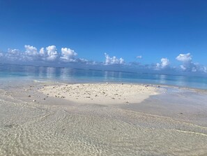 On the beach, sun loungers