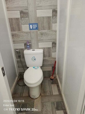 Toalhas de banho, papel higiênico