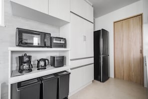Departamento | Cocina privada | Cafetera y tetera, refrigerador, microondas y parrilla de estufa